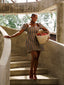 Tani Woven Raffia Dress in brown multicolour. Structured woven raffia midi dress with tie back by For Style's Sake