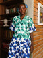 Blossom linen pant set front view. Mixed print shirt and trousers co-ord by For Style's Sake